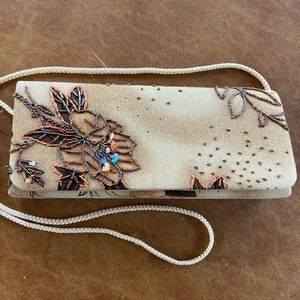 Hand painted, beaded and embroidered small cloth evening bag.